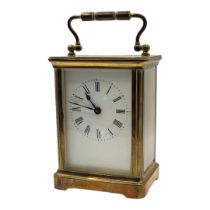 20TH CENTURY GILT METAL CARRIAGE CLOCK, HOUSED IN LATE 19TH/EARLY 20TH CENTURY LEATHER CARRIAGE