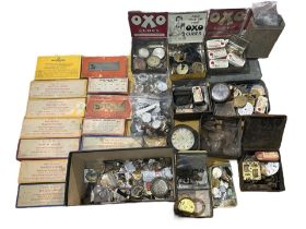 A LARGE COLLECTION OF 19TH AND 20TH CENTURY WATCH PARTS Comprising watch hands, movements, dials,