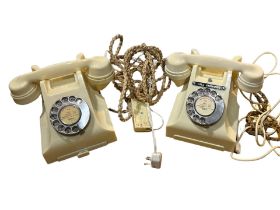 TWO TYPE 232 SERIES WHITE TELEPHONES Impressed and marked, one having exchange list drawer, both