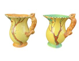 BURLEIGH WARE, POTTERY, TWO ART DECO SQUIRREL JUGS, CIRCA 1930 All having yellow ground, stylised