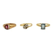 A 14CT YELLOW GOLD AND TWO STONE DIAMOND CROSSOVER RING, TOGETHER WITH A 9CT GOLD & GARNET RING