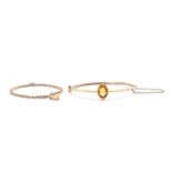 A gold hollow single stone citrine bangle,