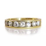 An 18ct gold seven stone diamond half eternity ring,