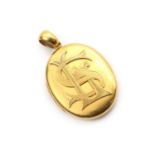 A Victorian gold oval locket pendant,