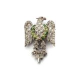 An eagle enamel, ruby and diamond brooch,