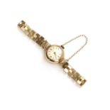 A ladies' 9ct gold Tissot mechanical bracelet watch,