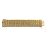 A woven gold bracelet, c.1960,