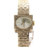 A ladies' 9ct gold Accurist mechanical bracelet watch,