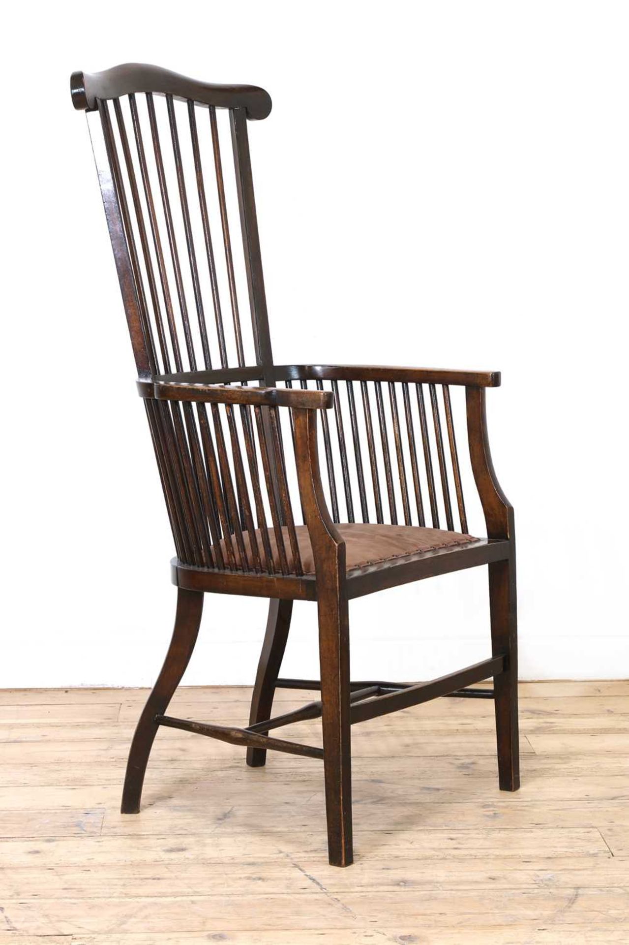 An Arts and Crafts mahogany armchair,