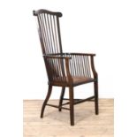 An Arts and Crafts mahogany armchair,