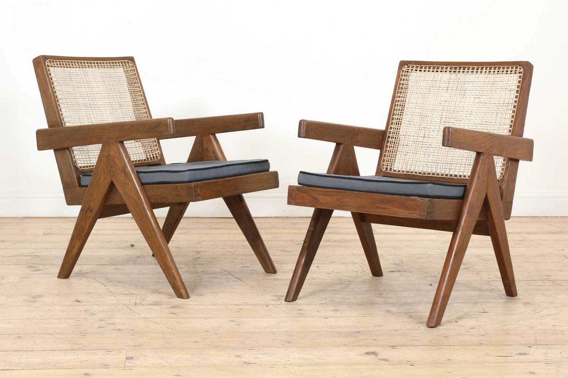 A pair of teak 'Low Easy Chair' armchairs,