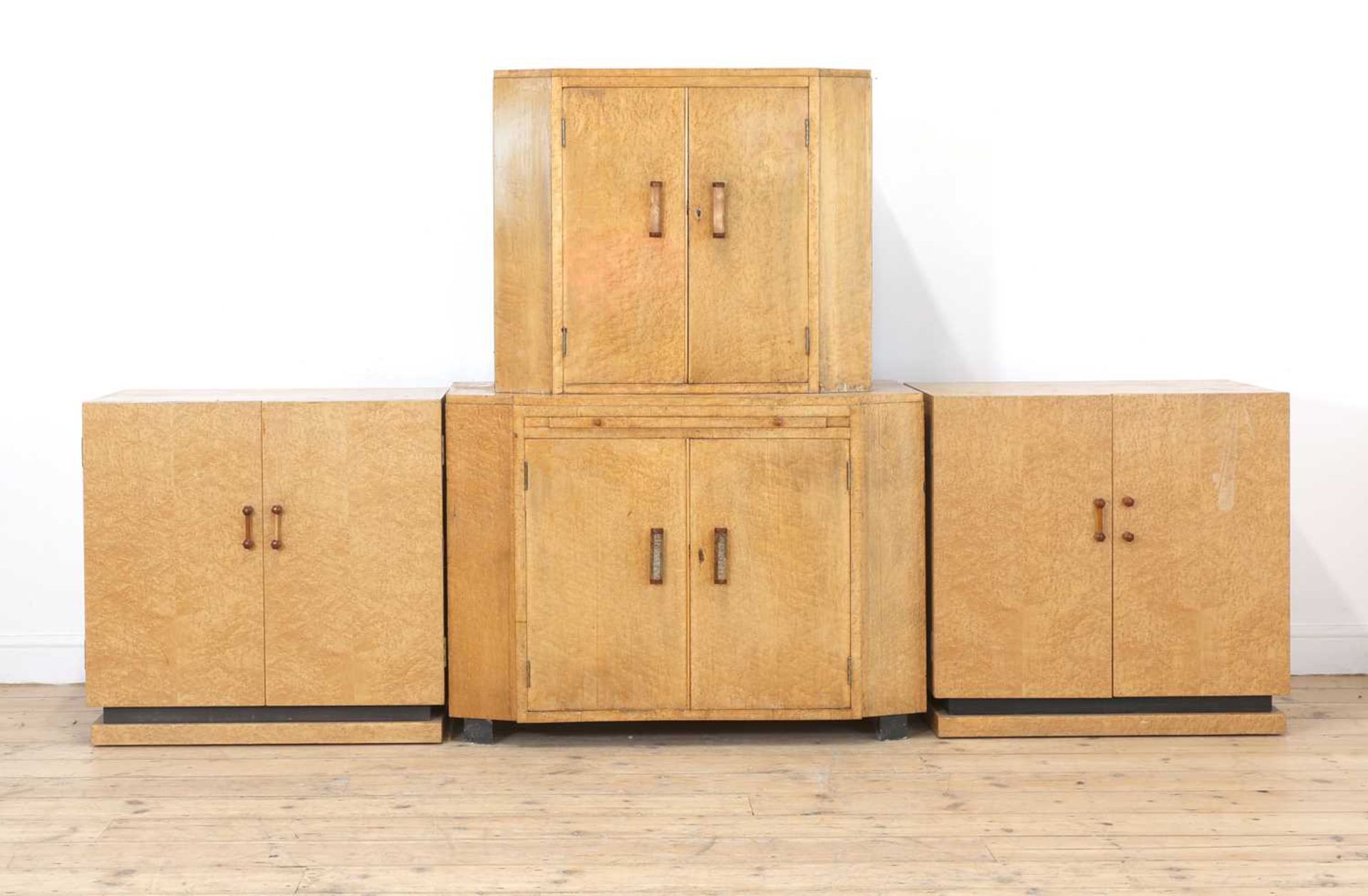 An Art Deco bird's-eye maple cocktail cabinet,