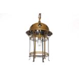 An Arts and Crafts brass hanging lantern,