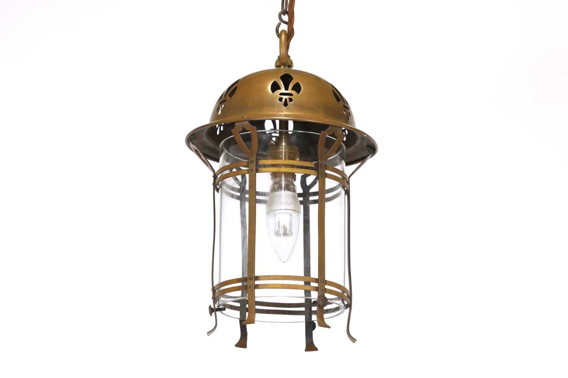 An Arts and Crafts brass hanging lantern,