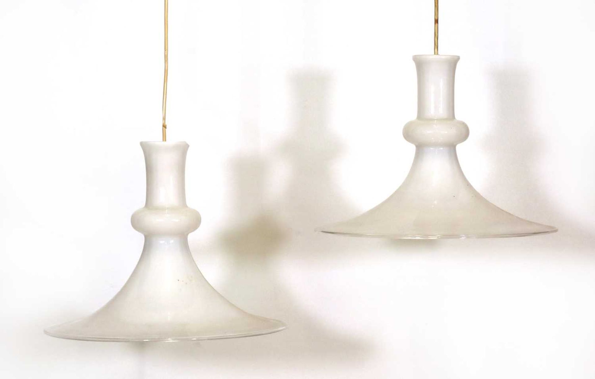 A pair of Danish cased glass ceiling lights,