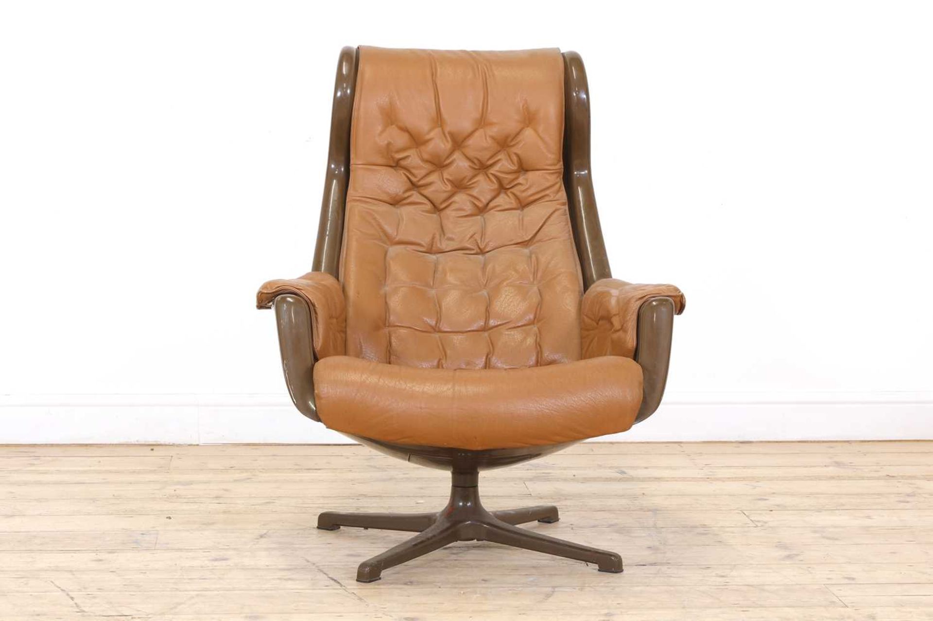 A Danish brown moulded plastic and tan leather lounger, - Bild 2 aus 12