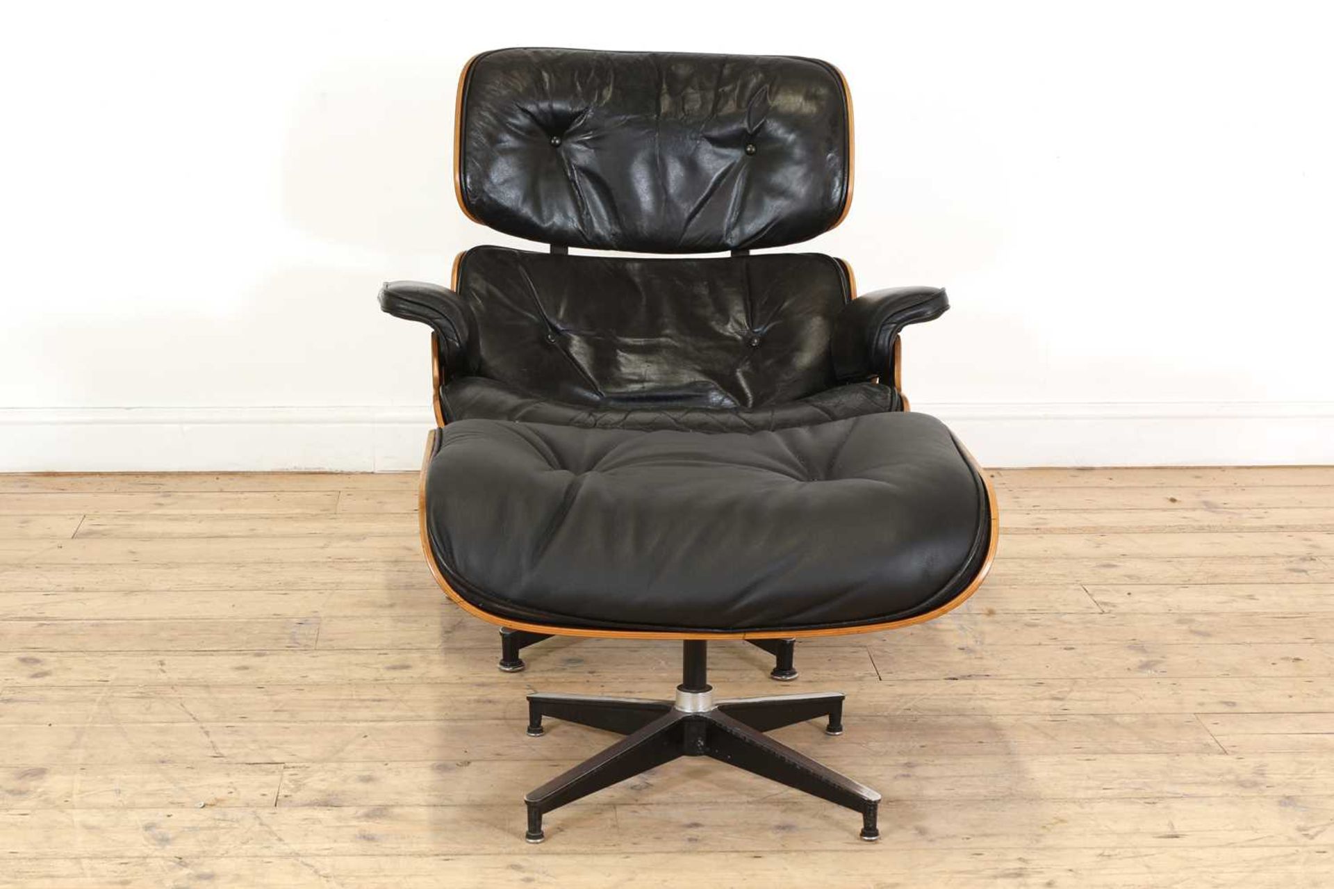 An Eames 'Model 670' and 'Model 671' rosewood lounge chair and ottoman, - Image 3 of 19