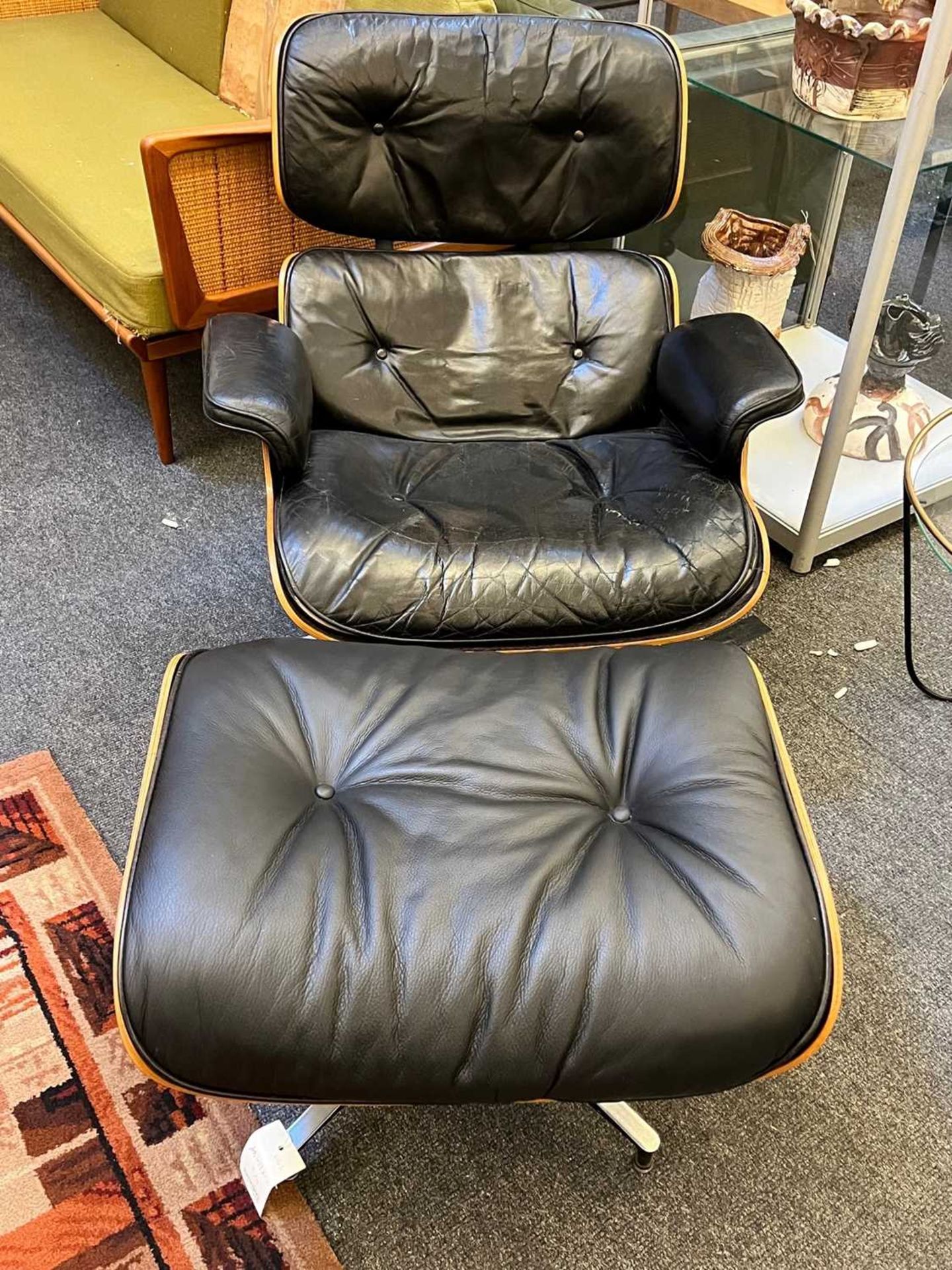 An Eames 'Model 670' and 'Model 671' rosewood lounge chair and ottoman, - Image 9 of 19