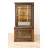 An Aesthetic Movement walnut vitrine,