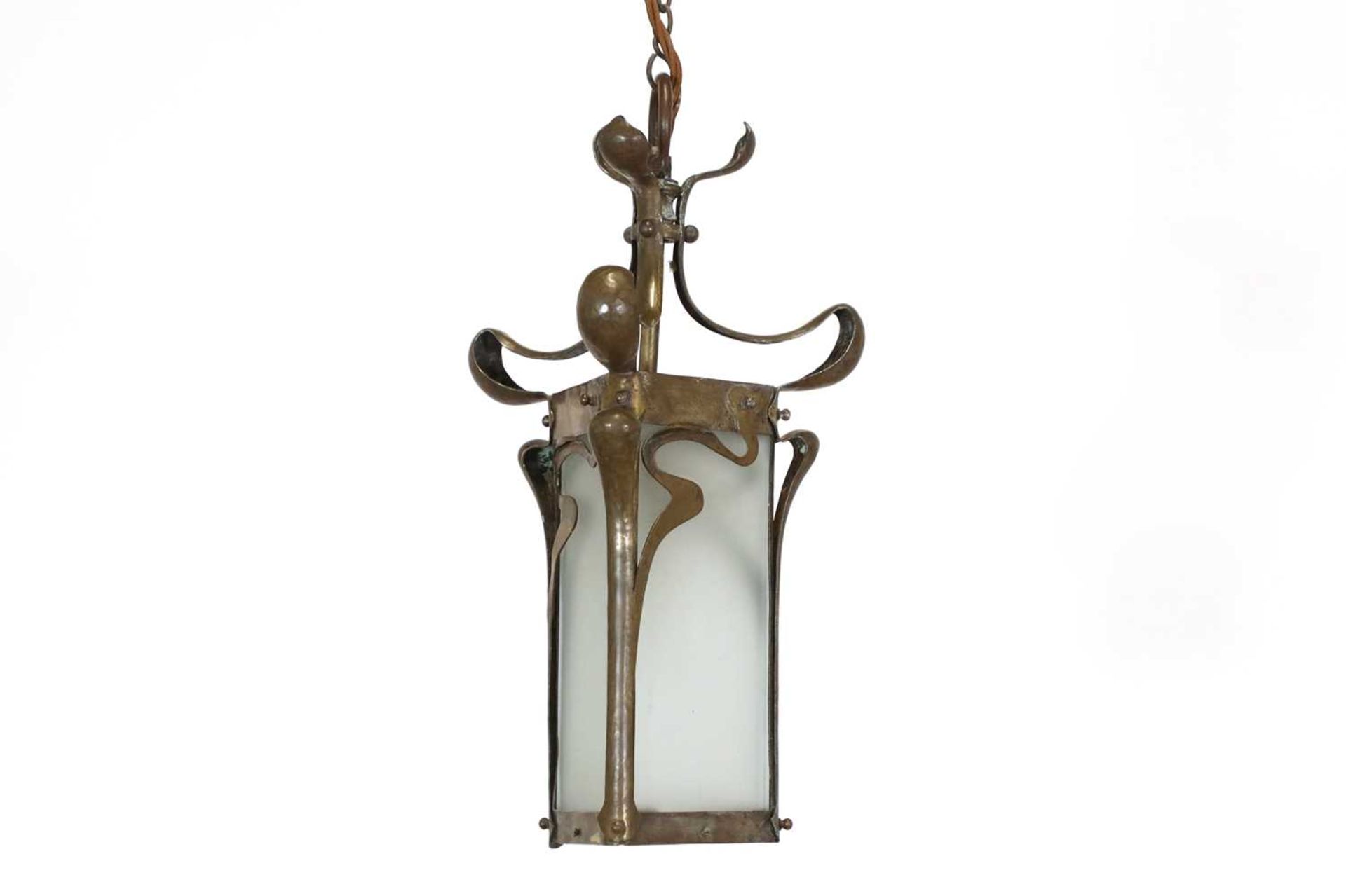 An Arts and Crafts brass hanging lantern,