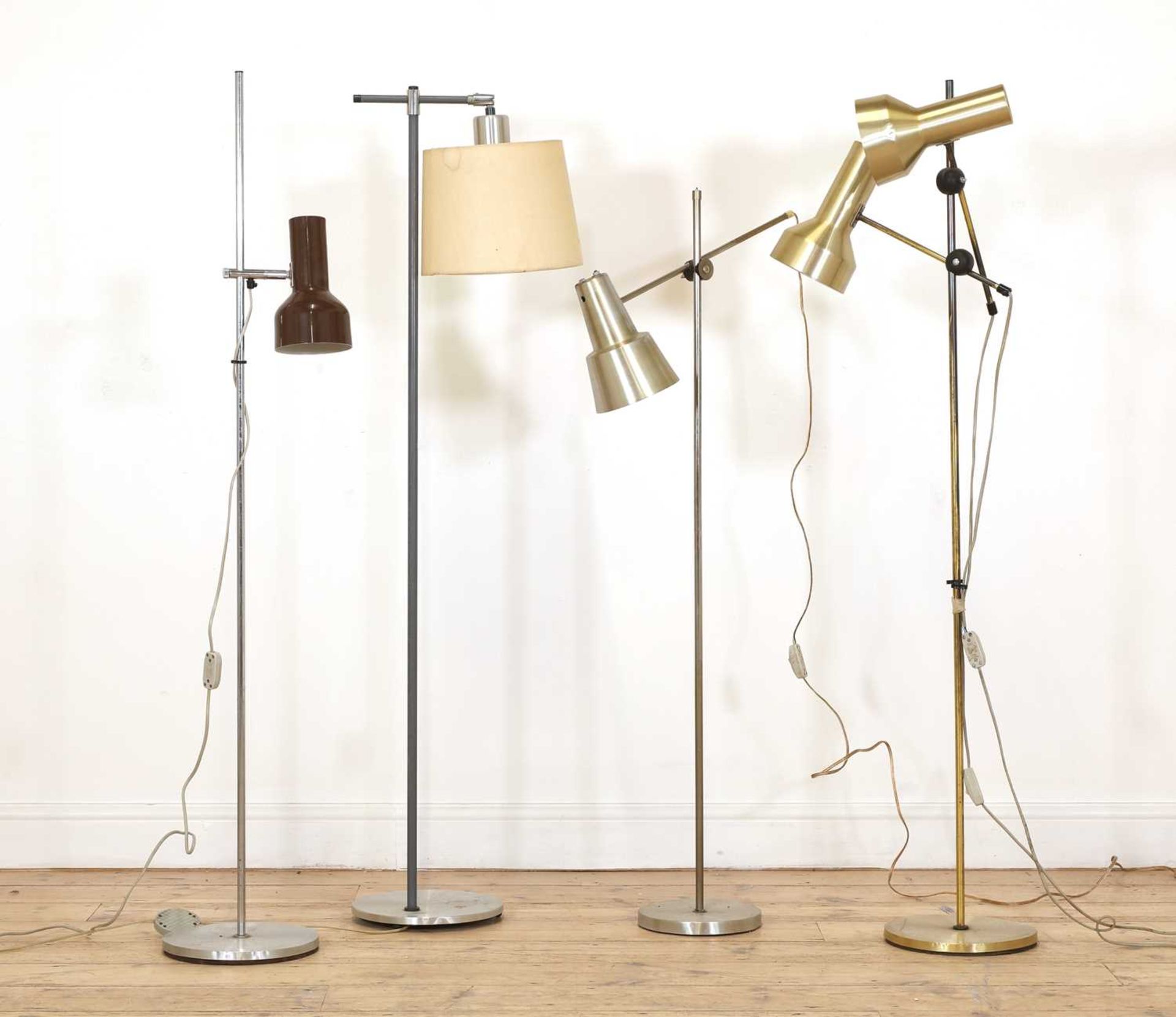Four Danish chrome floor lamps,