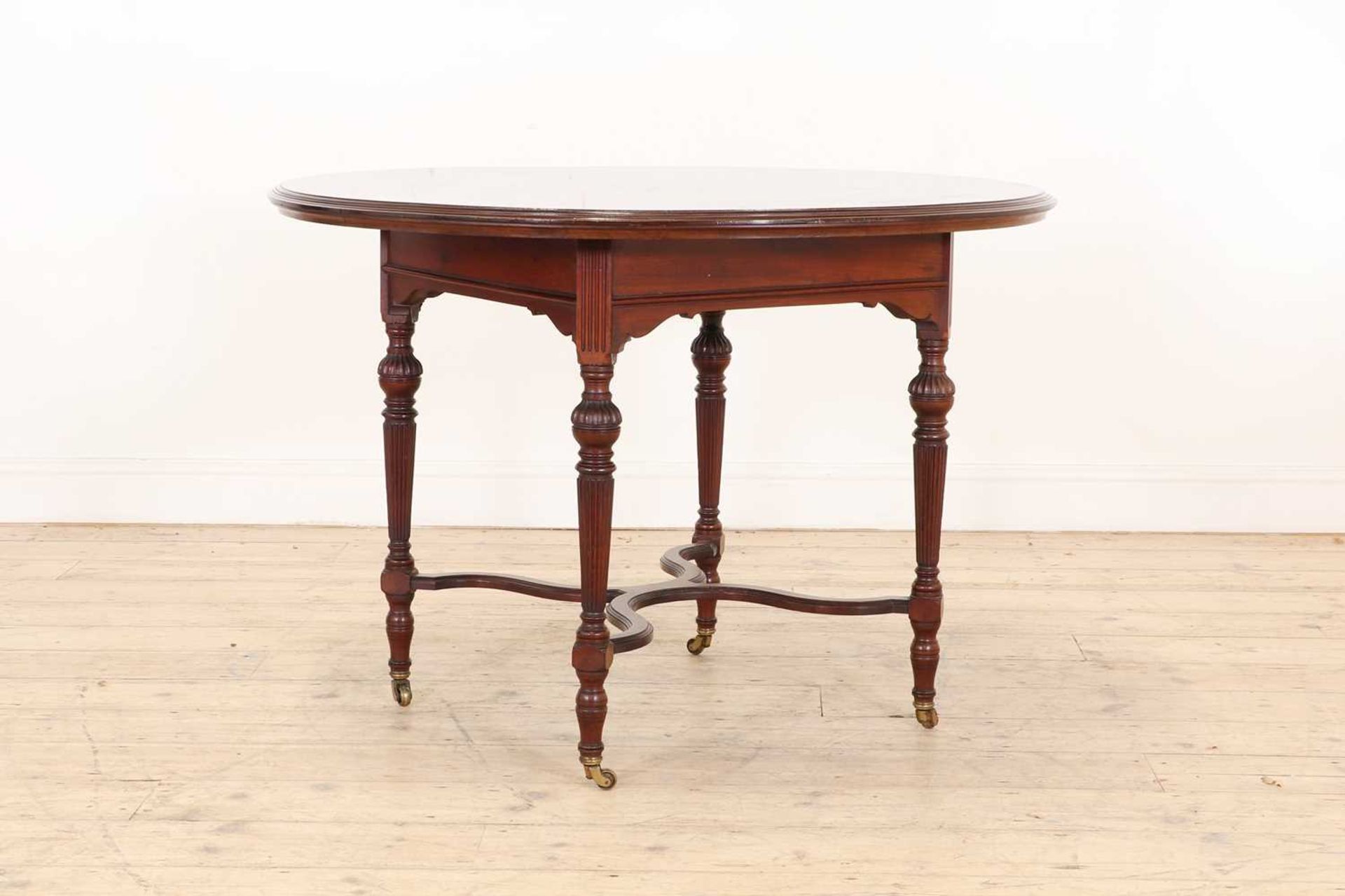 An Aesthetic Movement mahogany centre table,