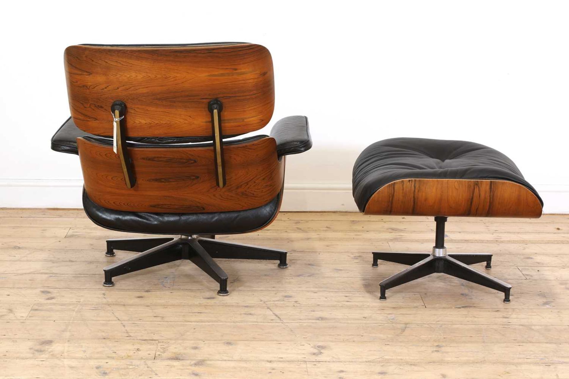 An Eames 'Model 670' and 'Model 671' rosewood lounge chair and ottoman, - Image 4 of 19