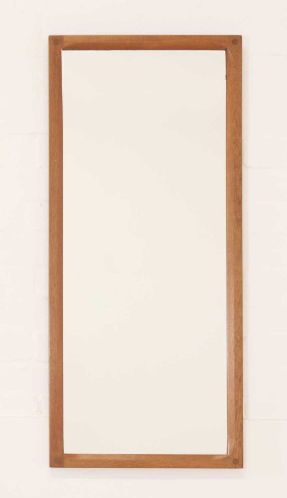 A Danish teak wall mirror,