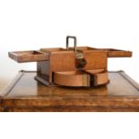 An Aesthetic Movement oak and brass-mounted cigar box,