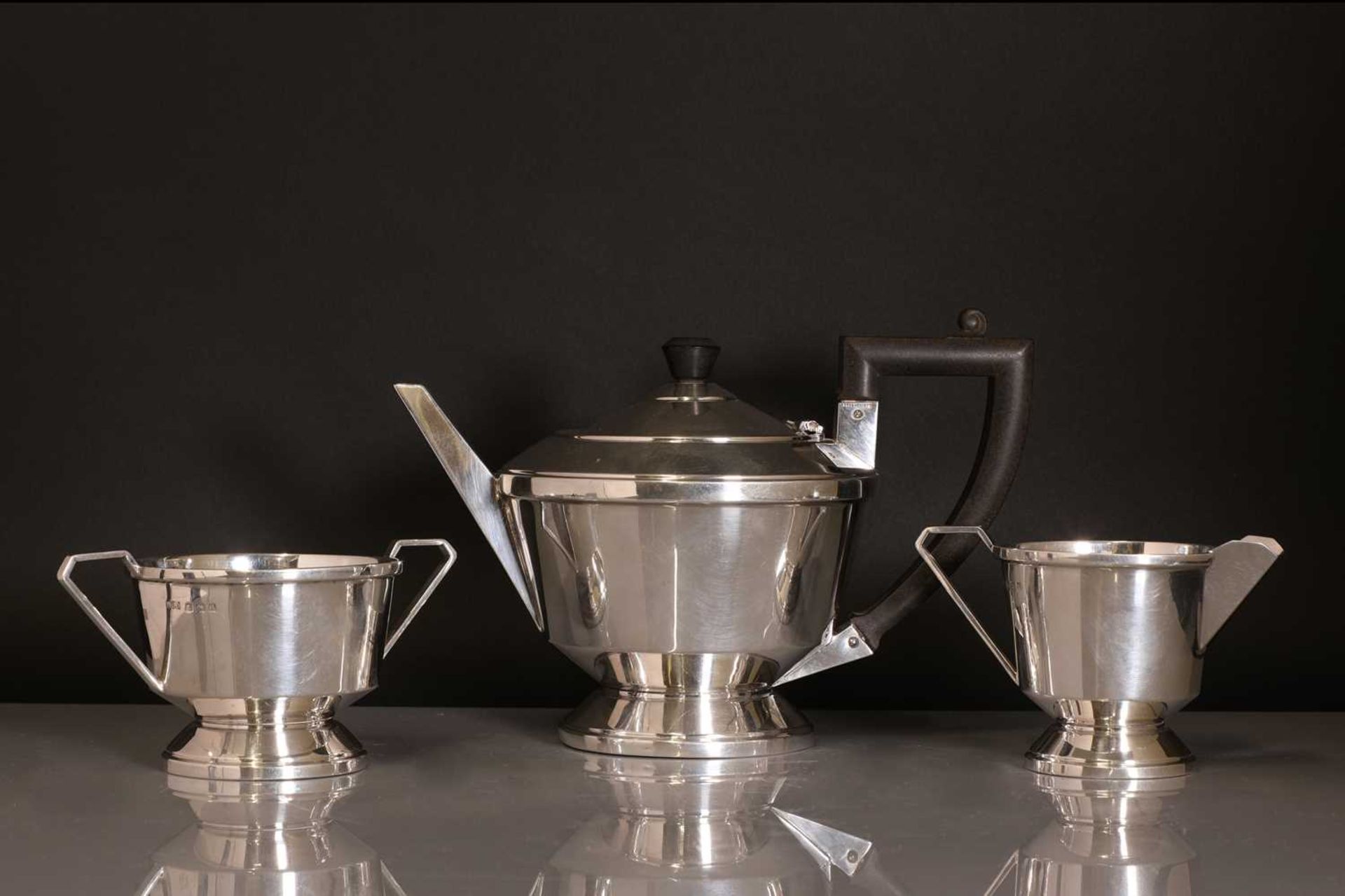 A silver three-piece tea set,