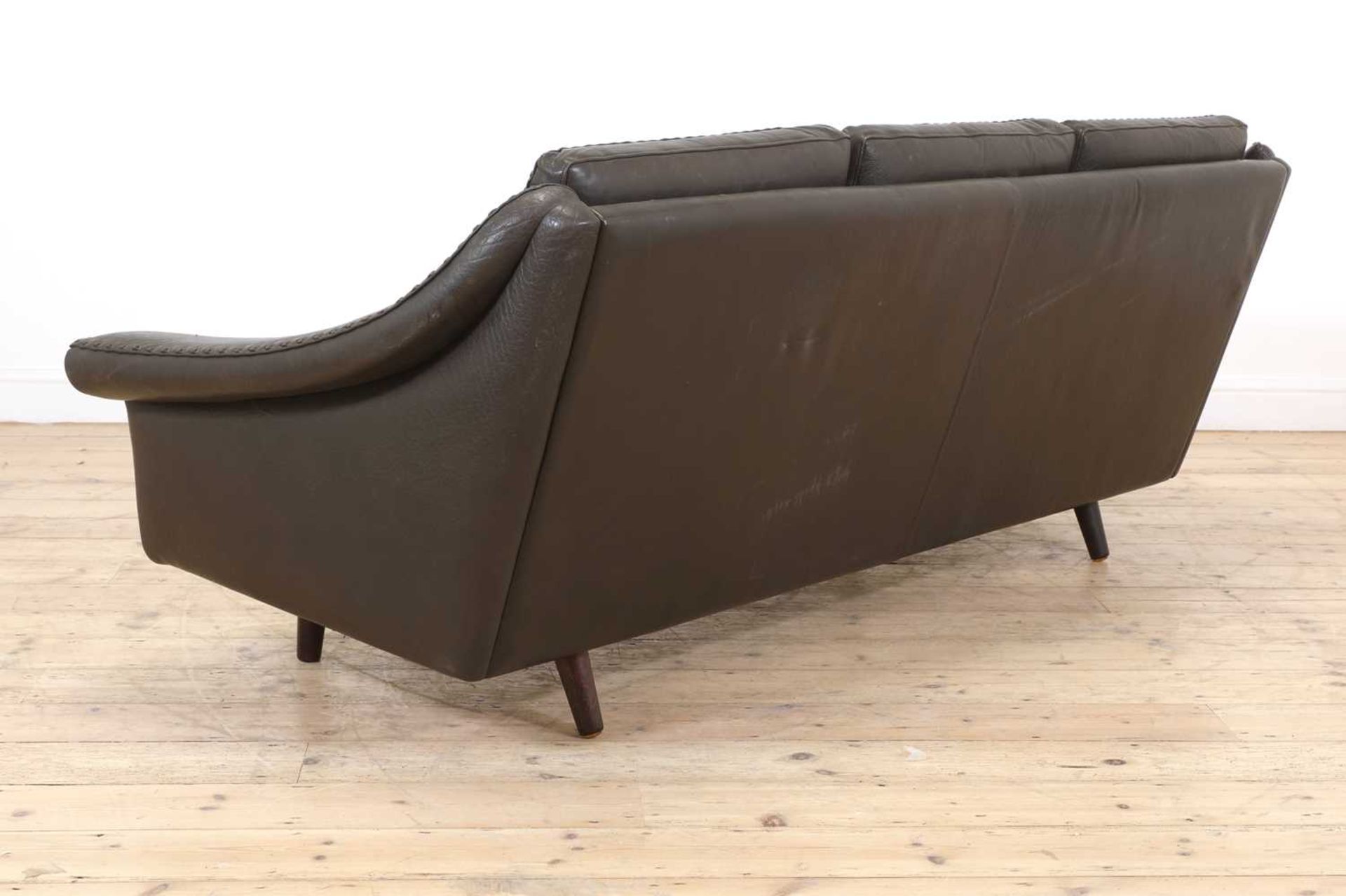 A Danish brown leather three-seater settee, - Bild 2 aus 3