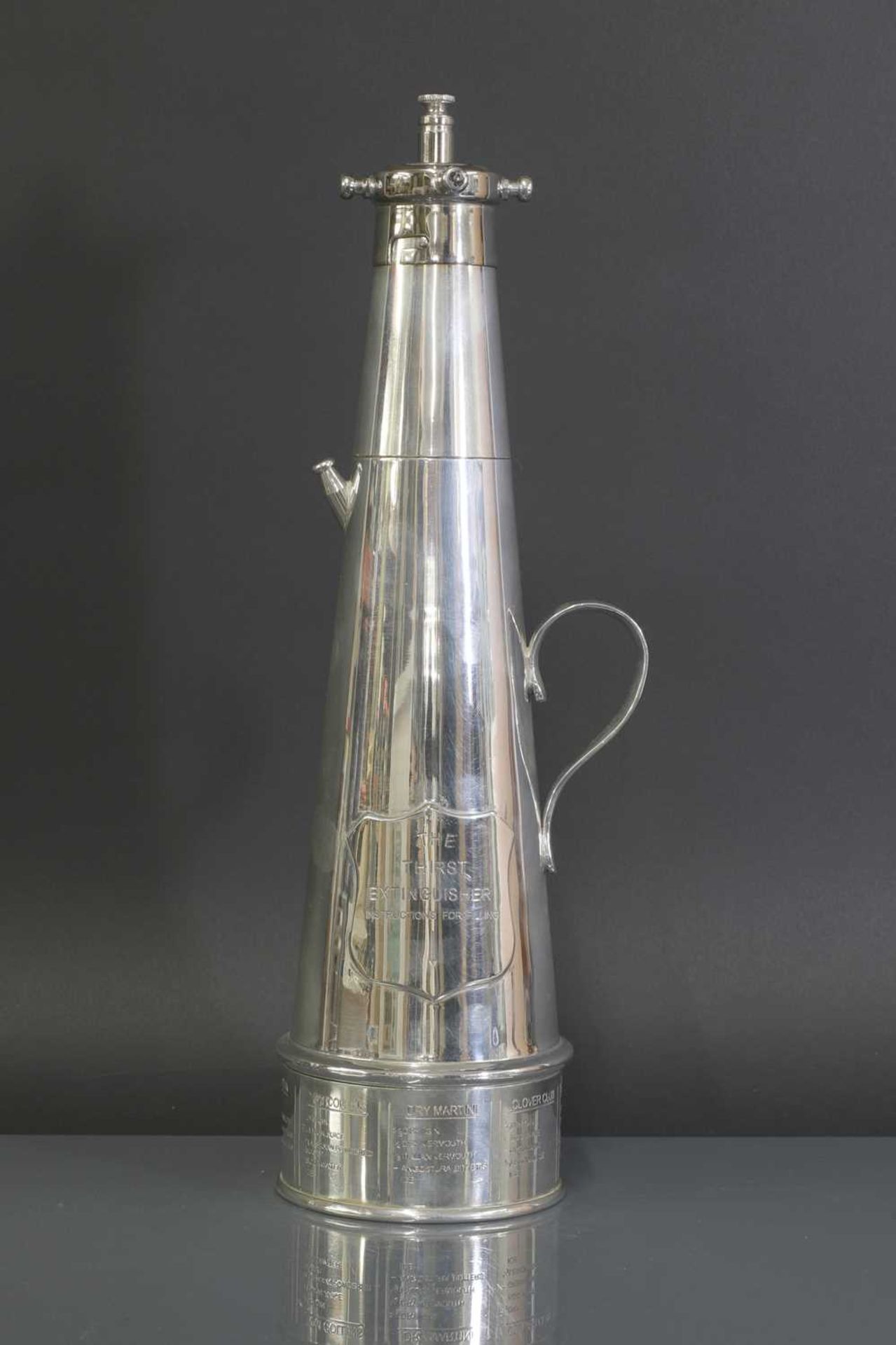 A Mappin and Webb silver-plated 'The Thirst Extinguisher' cocktail shaker