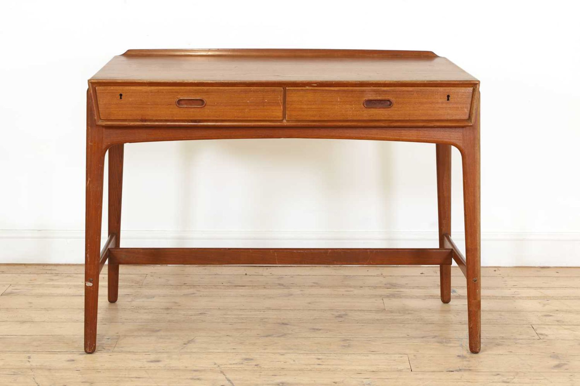 A Danish teak desk,