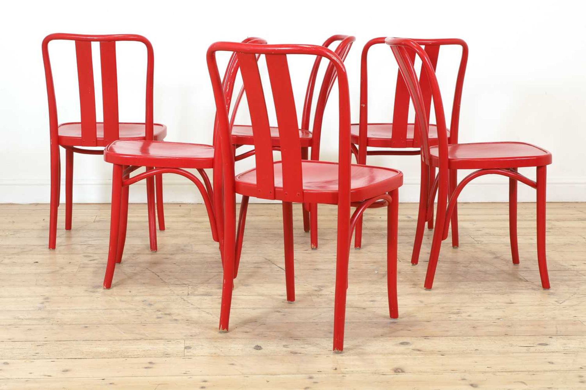 A set of six red 'Lena' bentwood chairs,