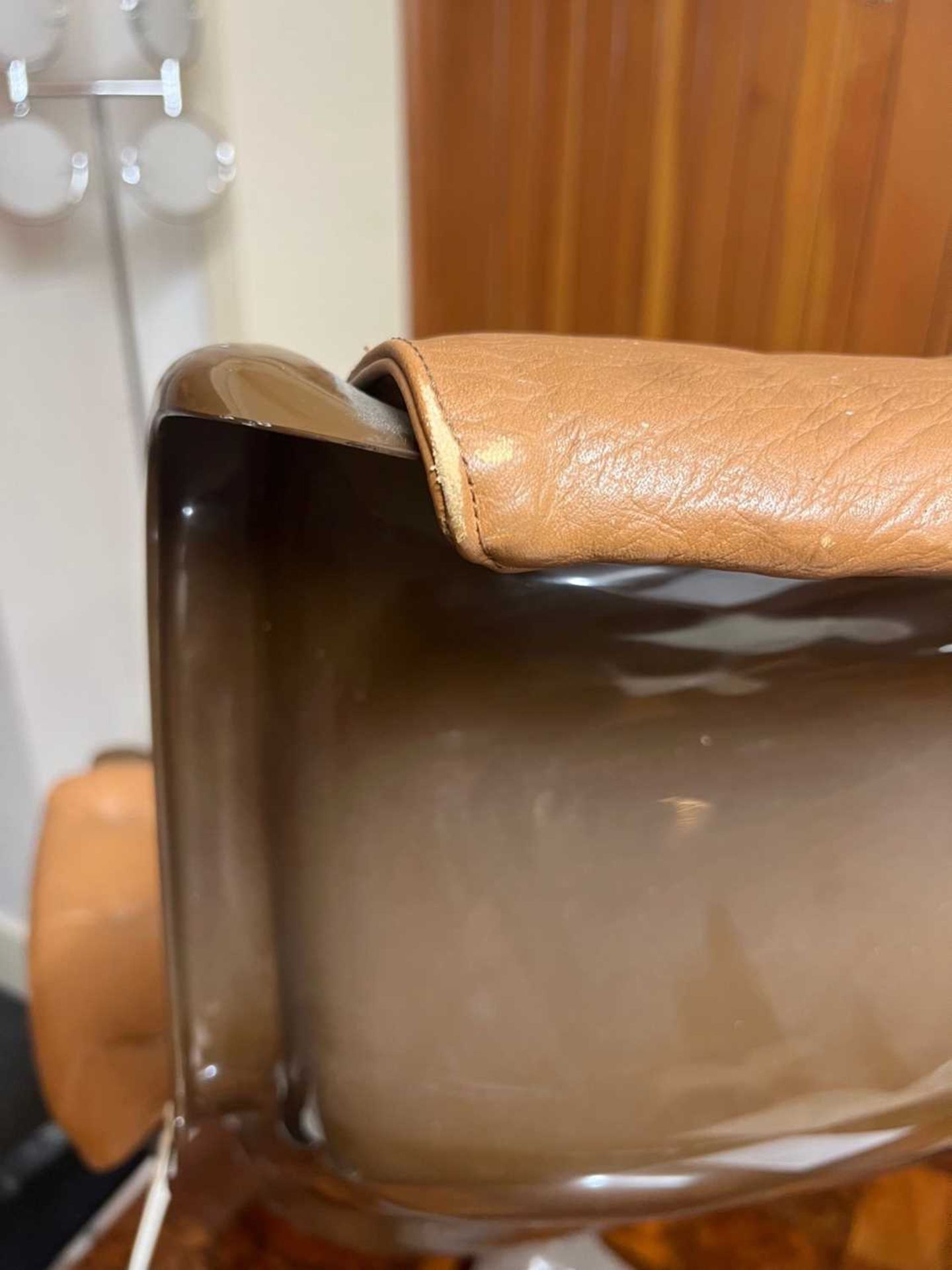 A Danish brown moulded plastic and tan leather lounger, - Bild 10 aus 12