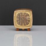 A Longines gilt and rosewood bedside clock,