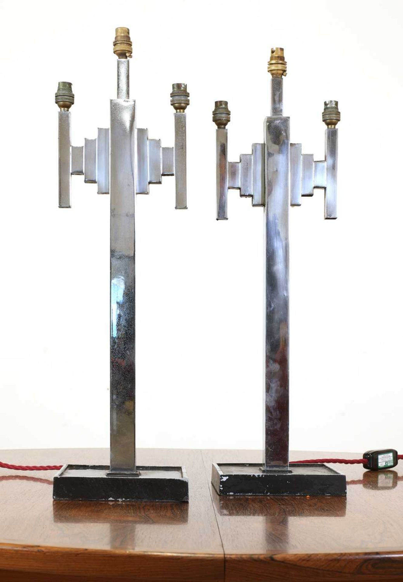 A pair of Art Deco chrome 'skyscraper' table lamps,