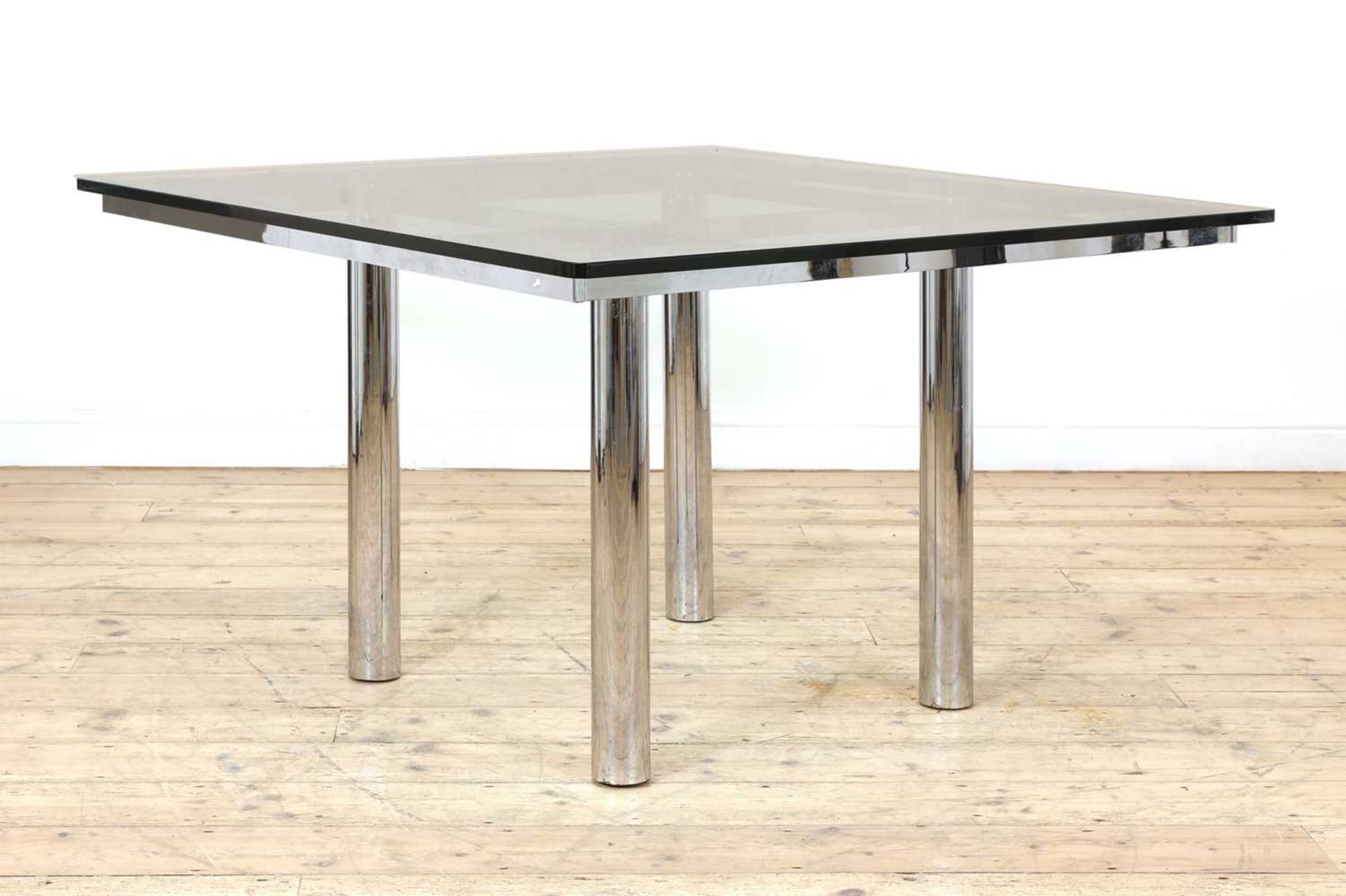 An 'Andre' dining table,