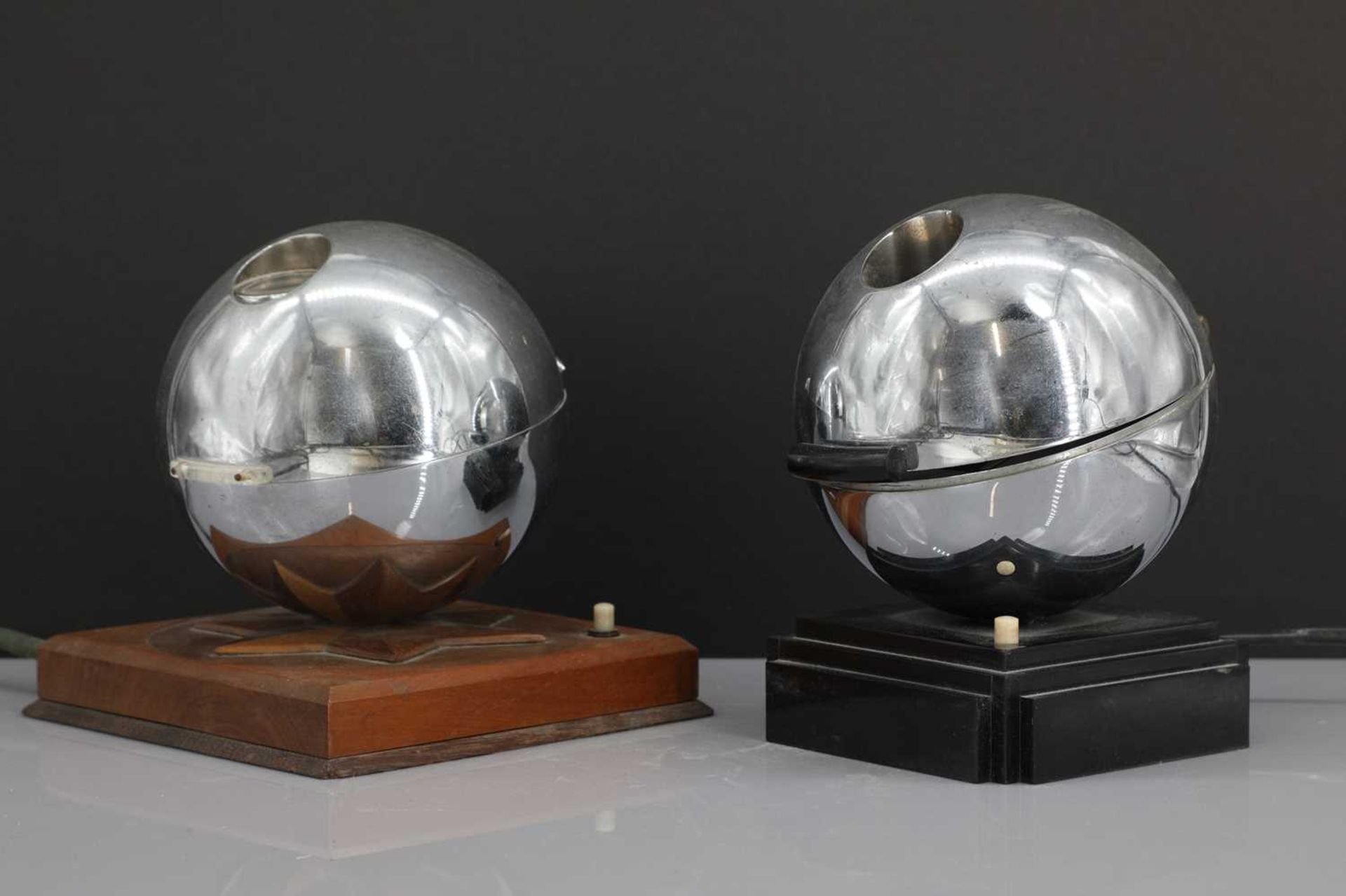 Two French Art Deco bedside globe watch stands,