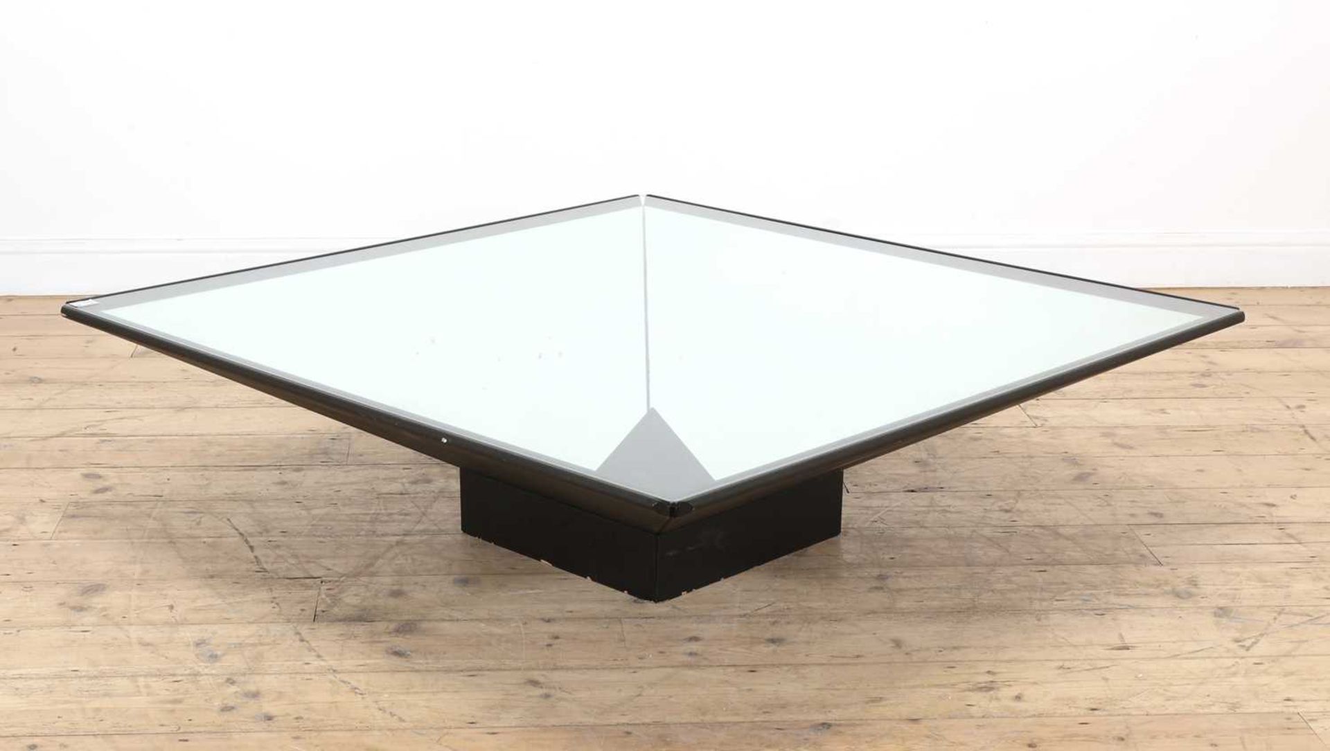 A mirrored geometric coffee table,