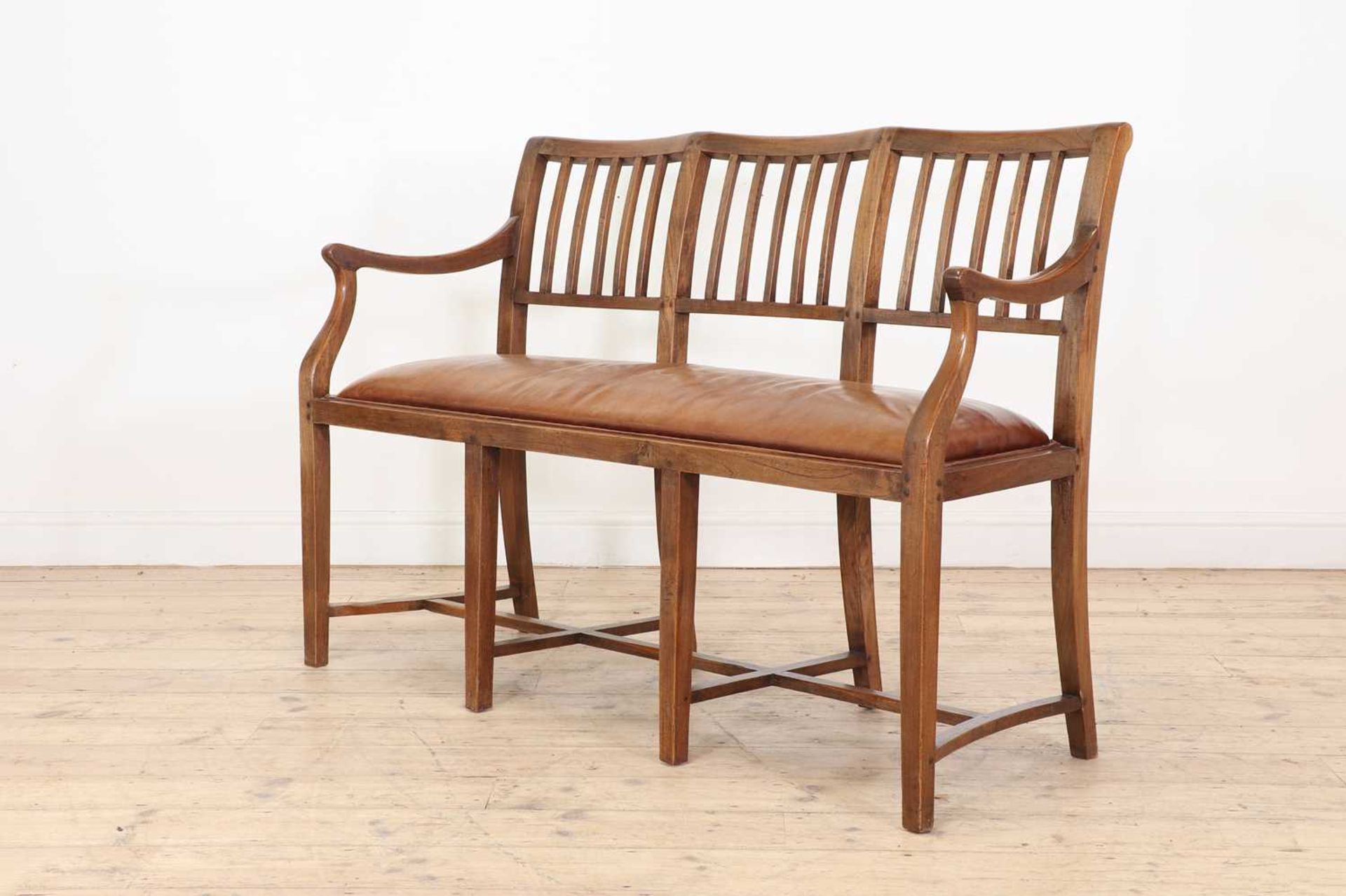 A Cotswold School oak chair-back settee,