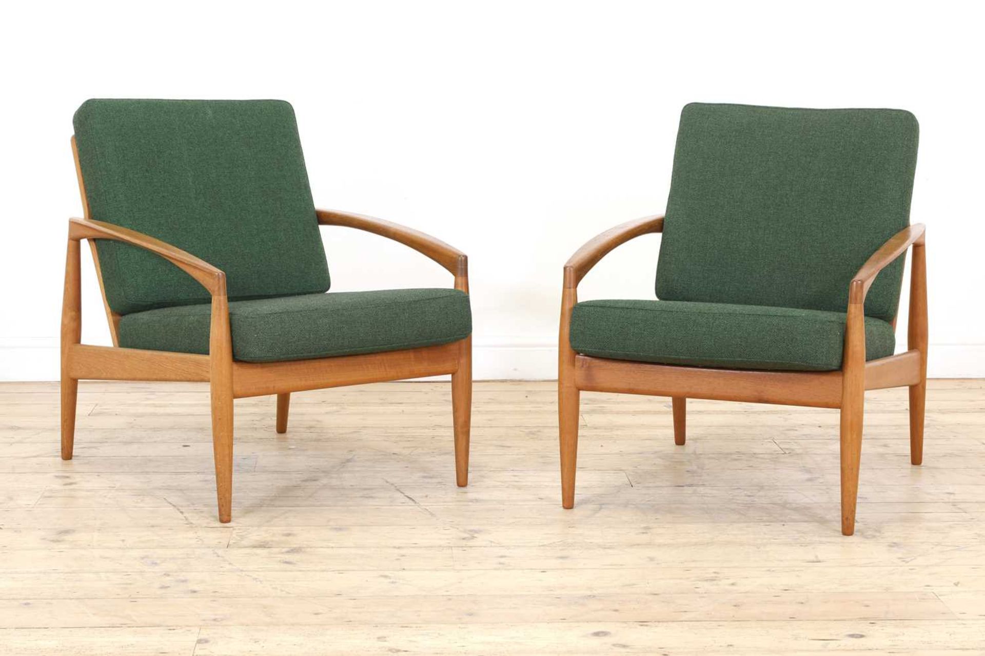 A pair of Danish 'Paper Knife' teak armchairs,