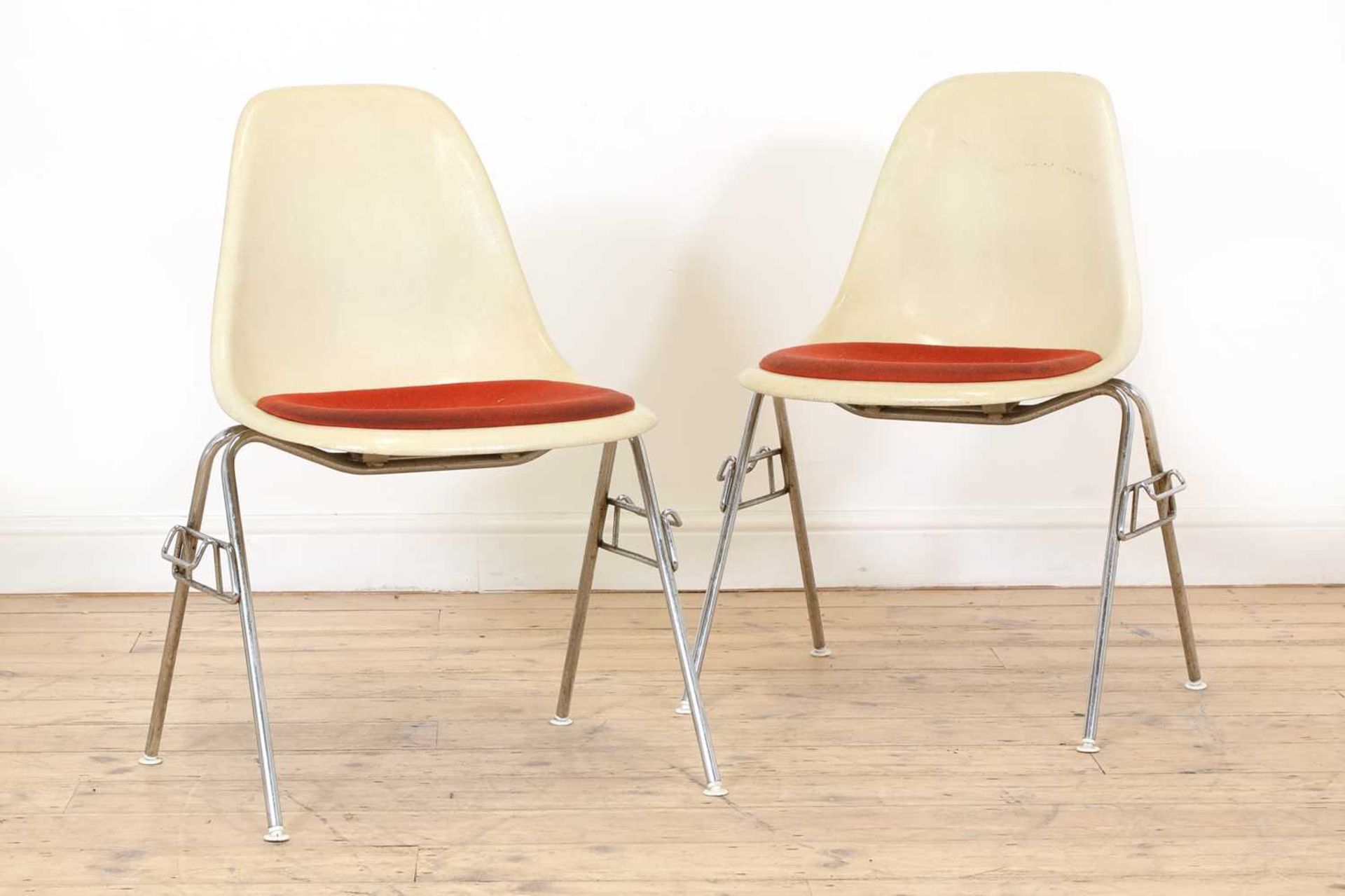 A pair of moulded 'DSS' stacking chairs,