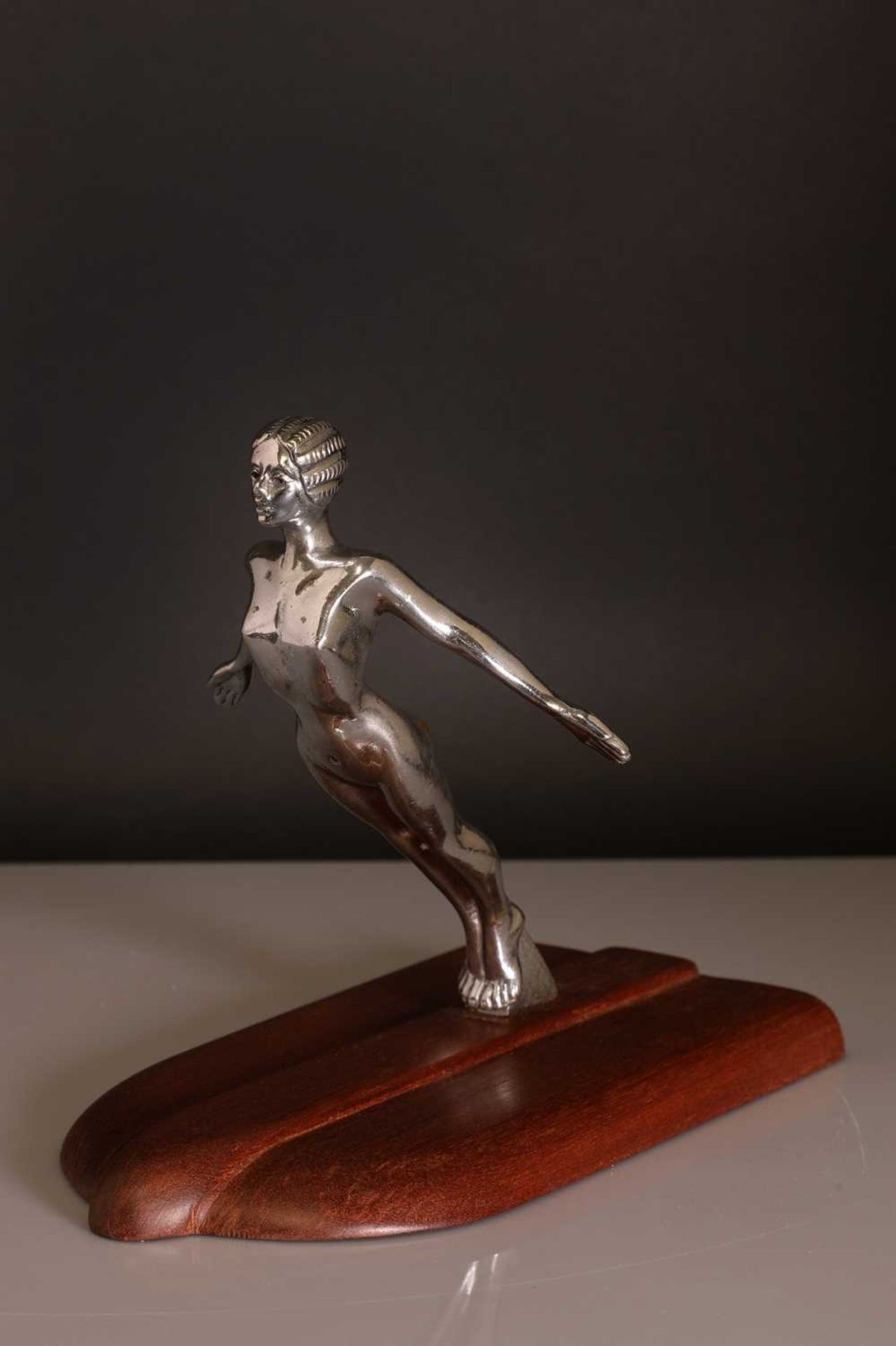 An Art Deco 'Desmo' cast and chrome car mascot,