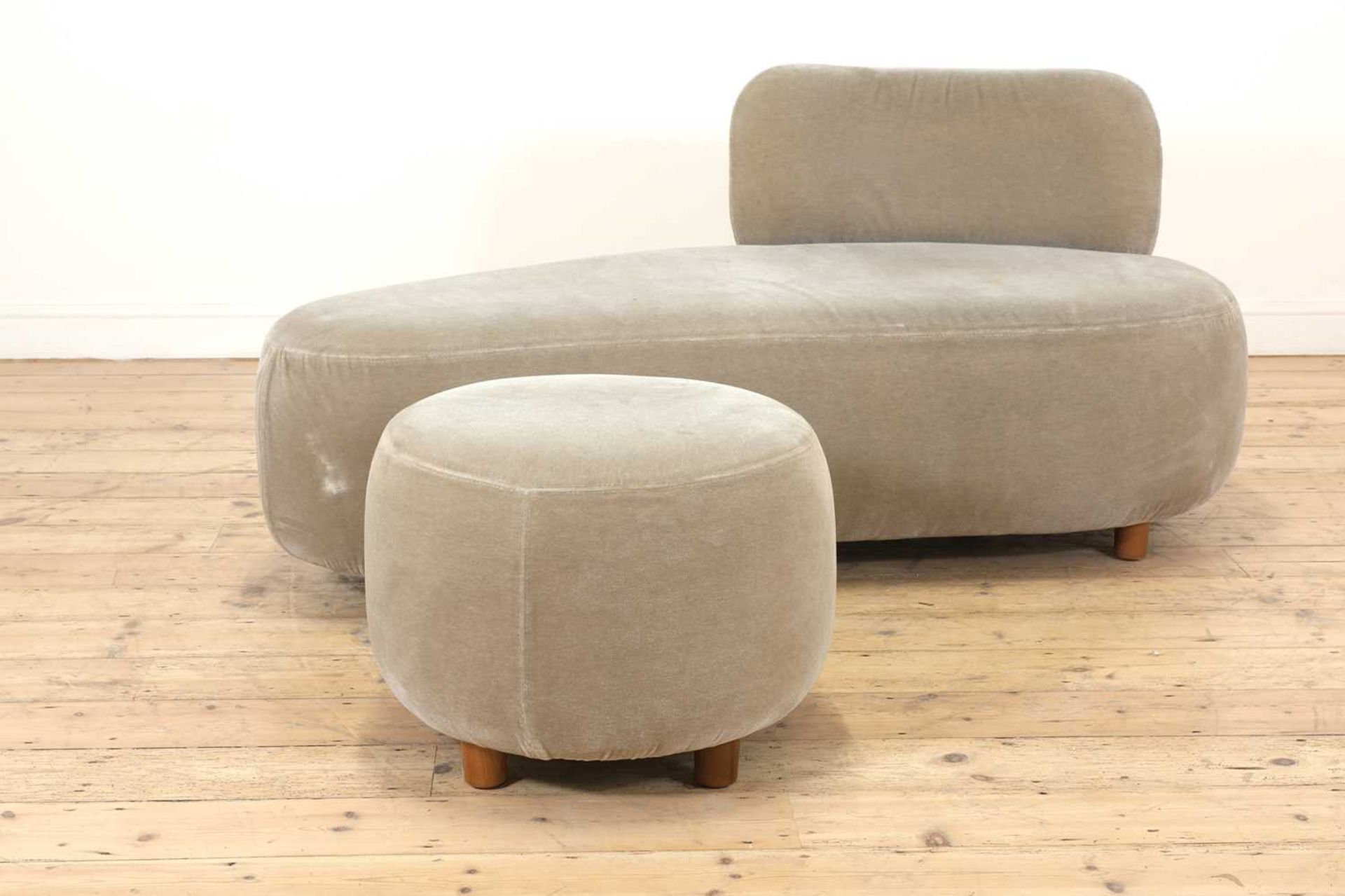 A contemporary chaise,