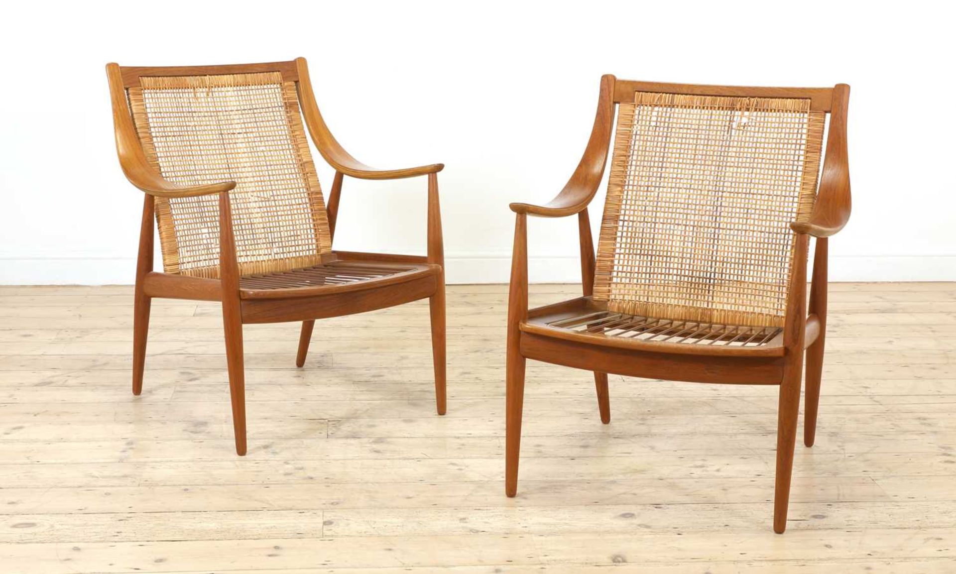 A pair of Danish 'FD147' teak easy armchairs,
