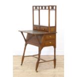 A walnut writing desk,