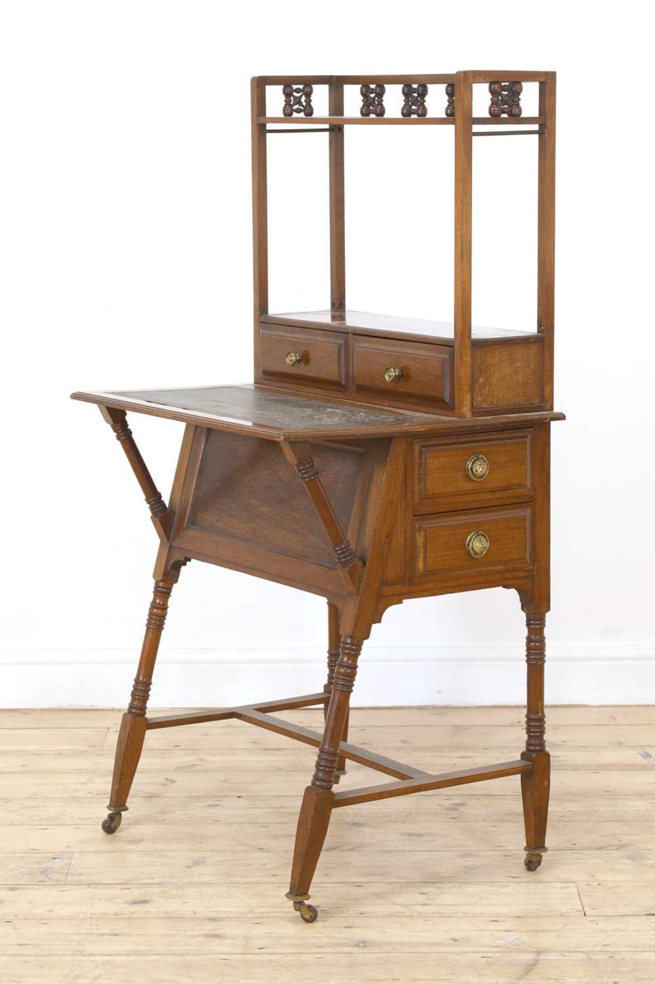 A walnut writing desk,