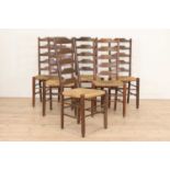 A set of six Heal's oak ladder-back chairs,