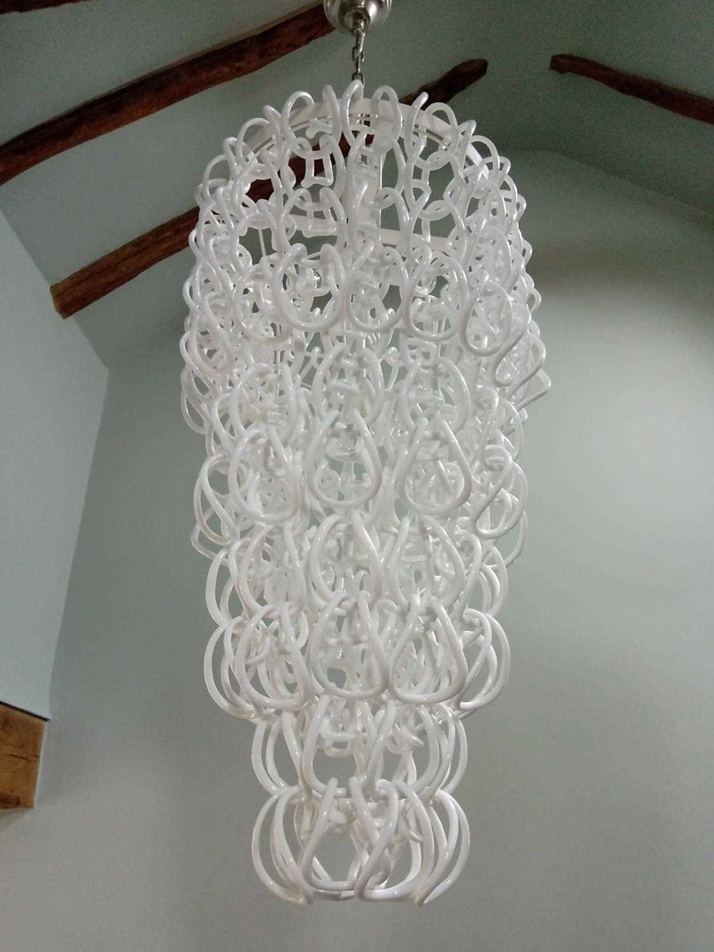A contemporary glass hook chandelier,